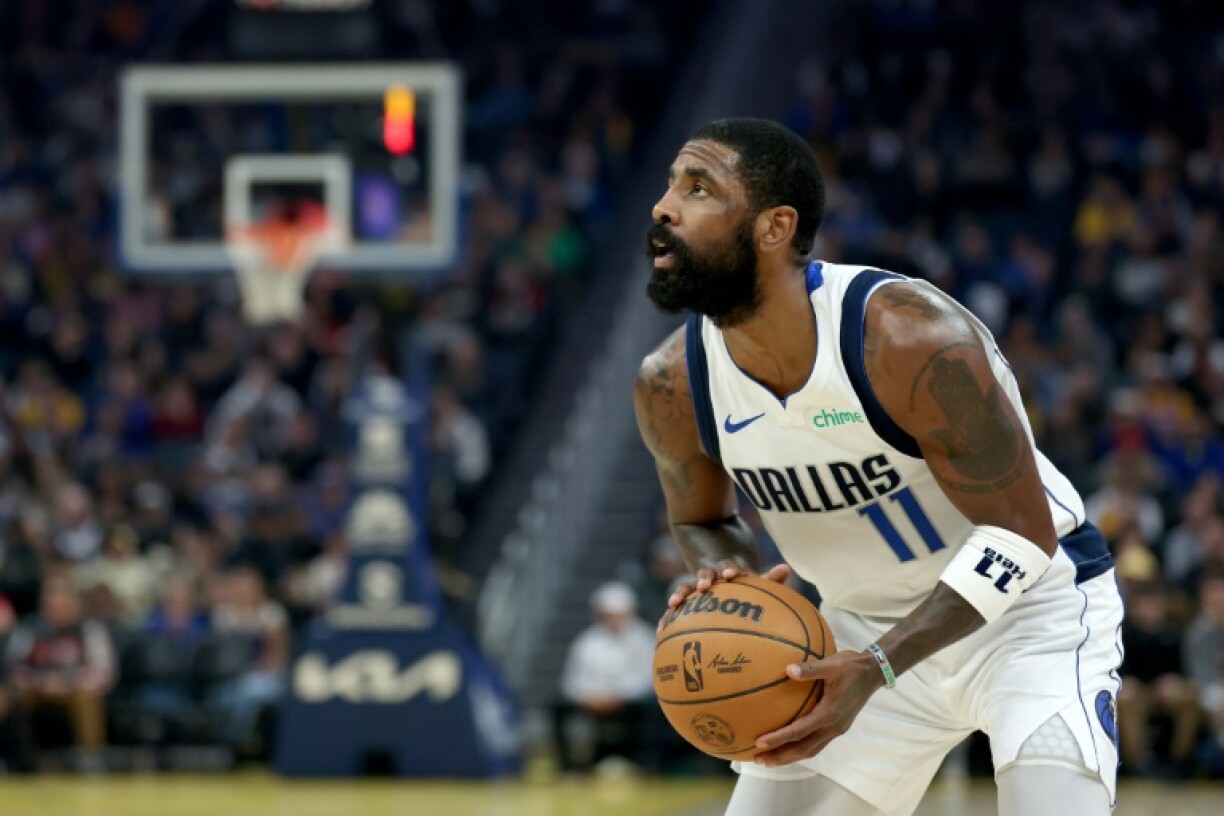 Kyrie Irving of the Dallas Mavericks shoots the ball in an NBA Game against the Golden State Warriors