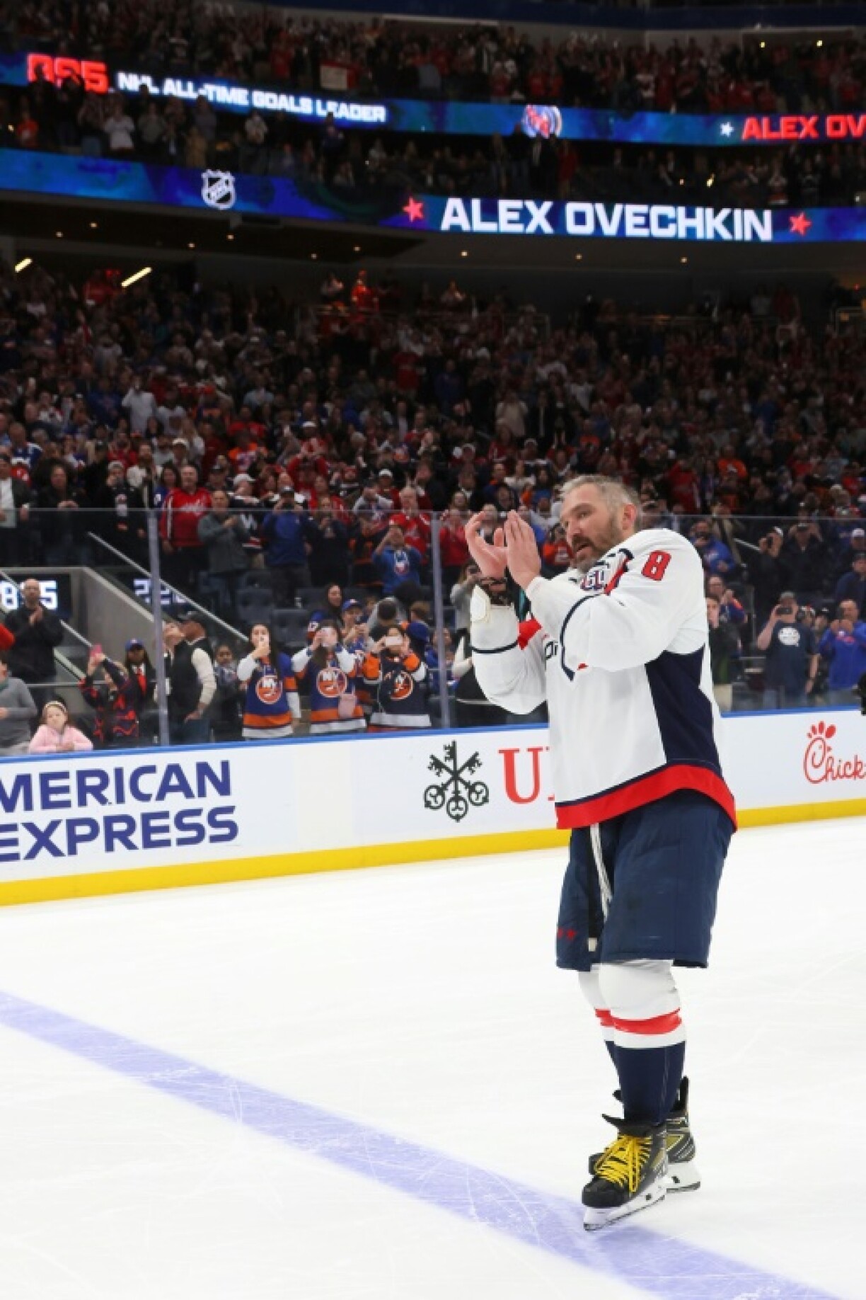 Alex Ovechkin celebrates after scoring his 895the career goal on Sunday, a new NHL record