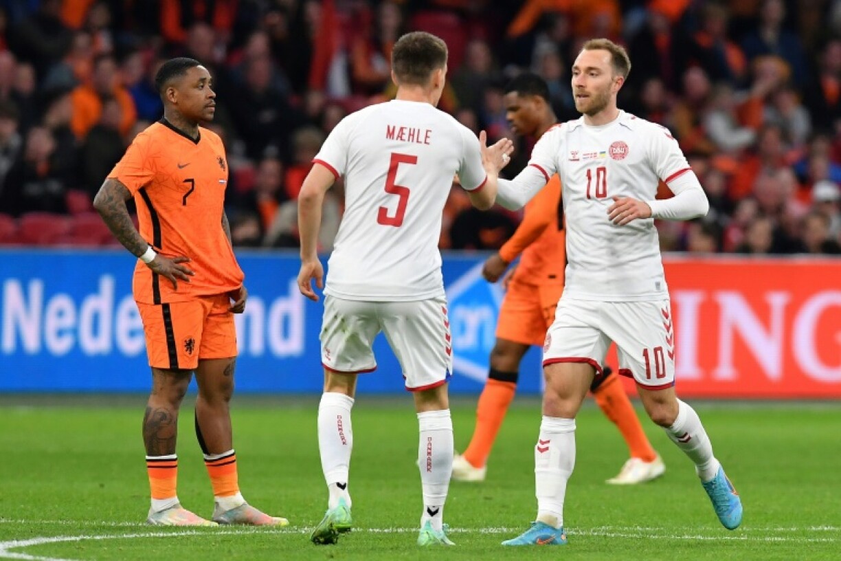 La joie du Danois Christian Eriksen, après avoir marqué contre les Pays-Bas, lors de leur match amical, le 26 mars 2022 à la Johaan-Cruijff ArenA à Amsterdam