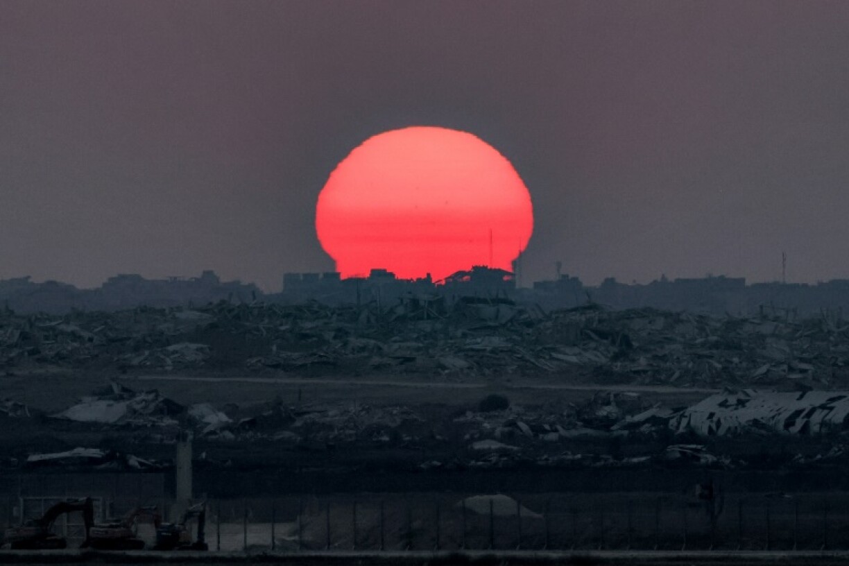 The sun sets over the Gaza Strip on August 10, 2025