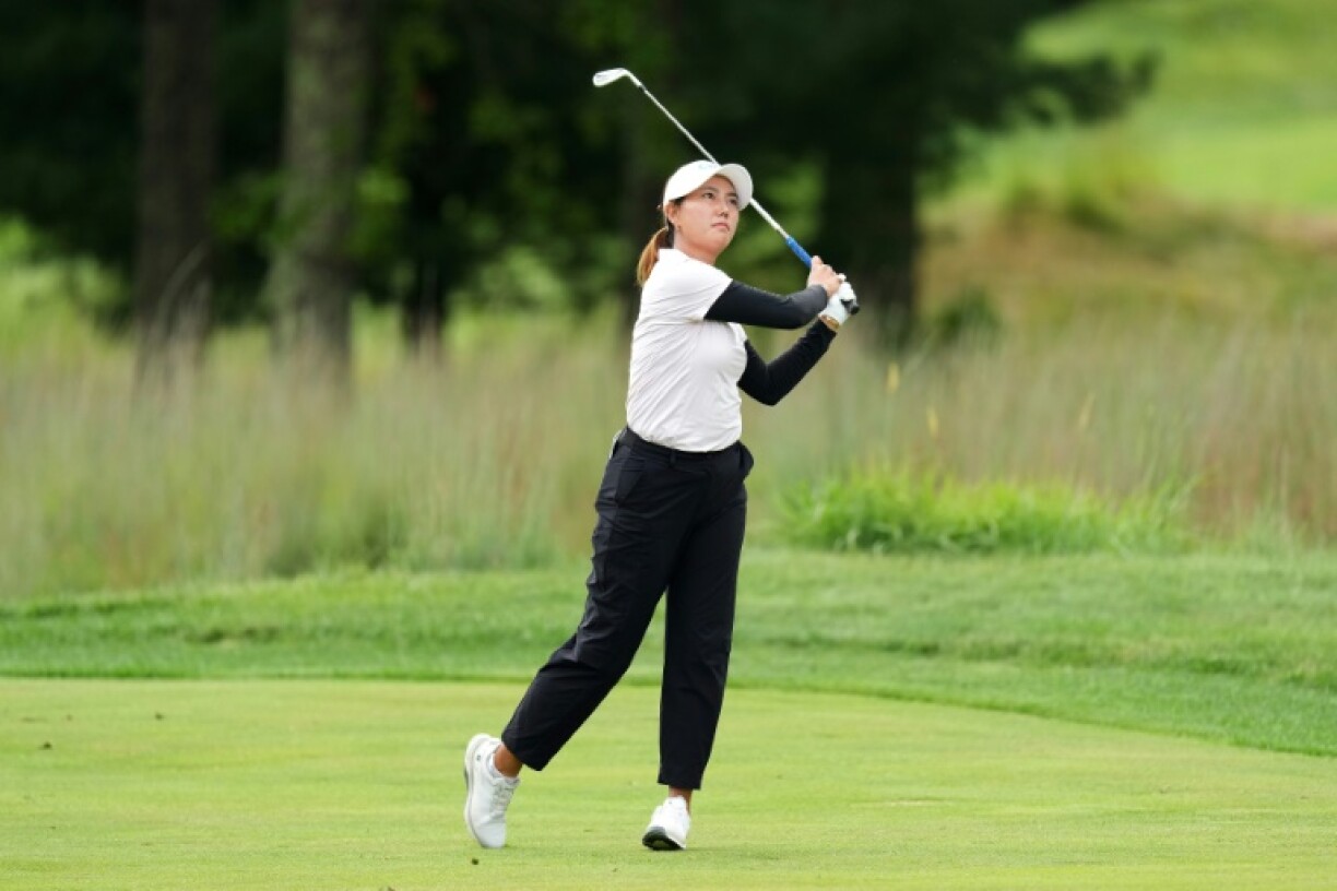 China's Miranda Wang grabbed a two-stroke lead in the storm-hit second round of the LPGA's FM Championship at TPC Boston
