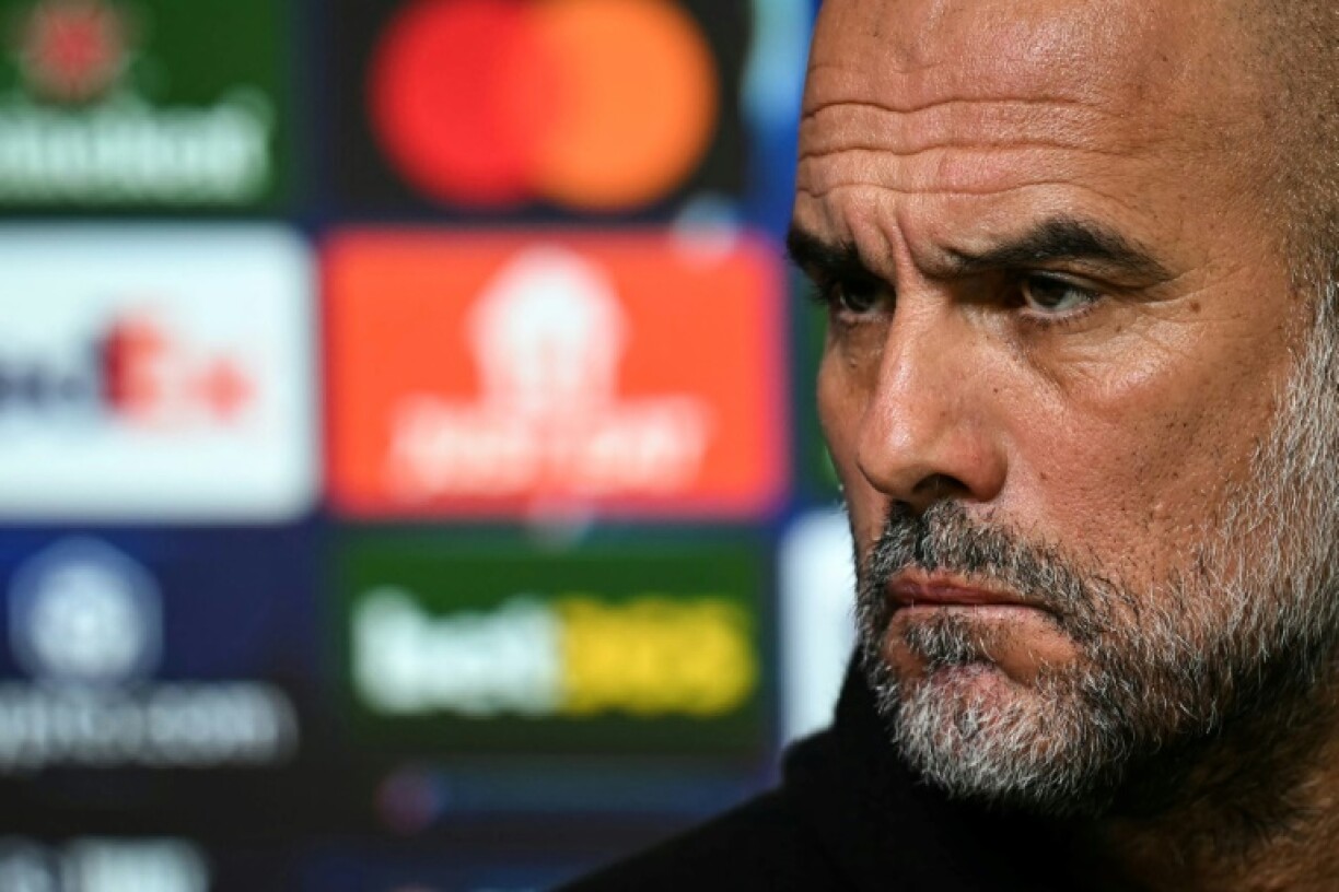 Manchester City manager Pep Guardiola speaks to the press on the eve of the first leg of their Champions League playoff against Real Madrid