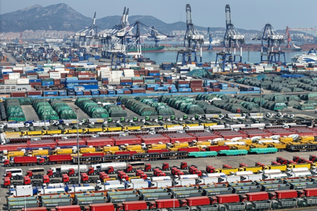 Cars and other vehicles for export are seen at a port in Yantai, in eastern China's Shandong province, on April 3, 2025