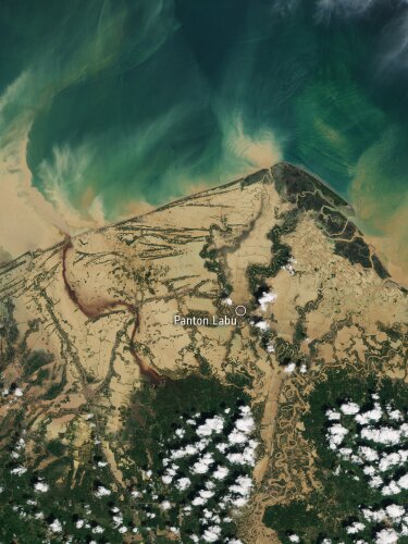 Taken by Copernicus Sentinel 2, this image shows the flooding near the city of Lhokseumawe, on the northern coast of Aceh province on the island of Sumatra, Indonesia.