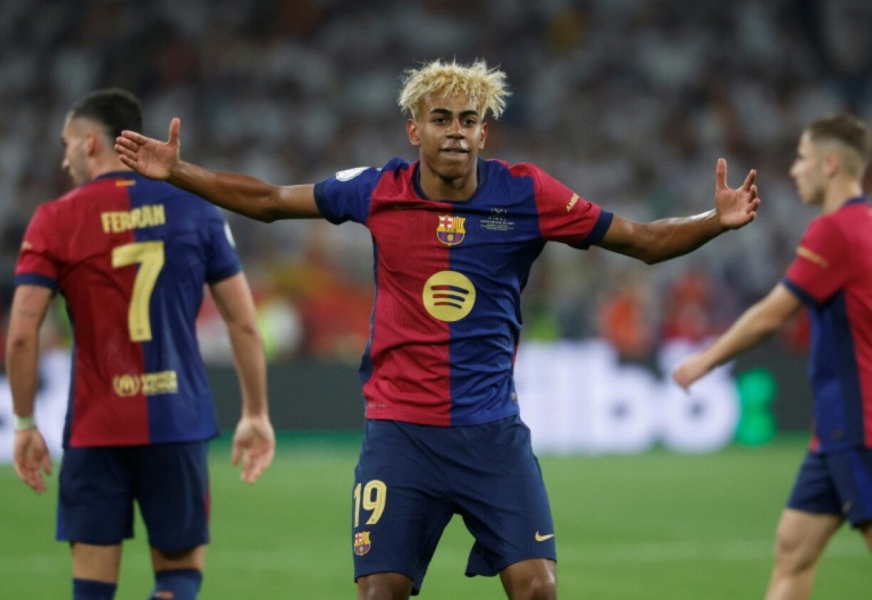 Barcelona's Spanish forward Lamine Yamal celebrates during the Copa del Rey final win over Real Madrid