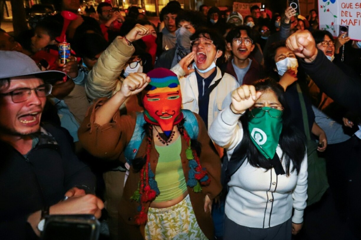 Demonstrators gather outside Peru's parliament after the president's impeachment