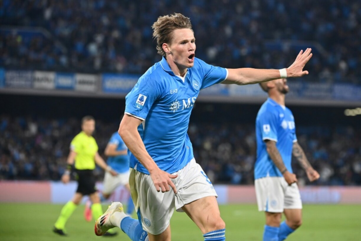 Scott McTominay celebrates scoring Napoli's first goal against Cagliari