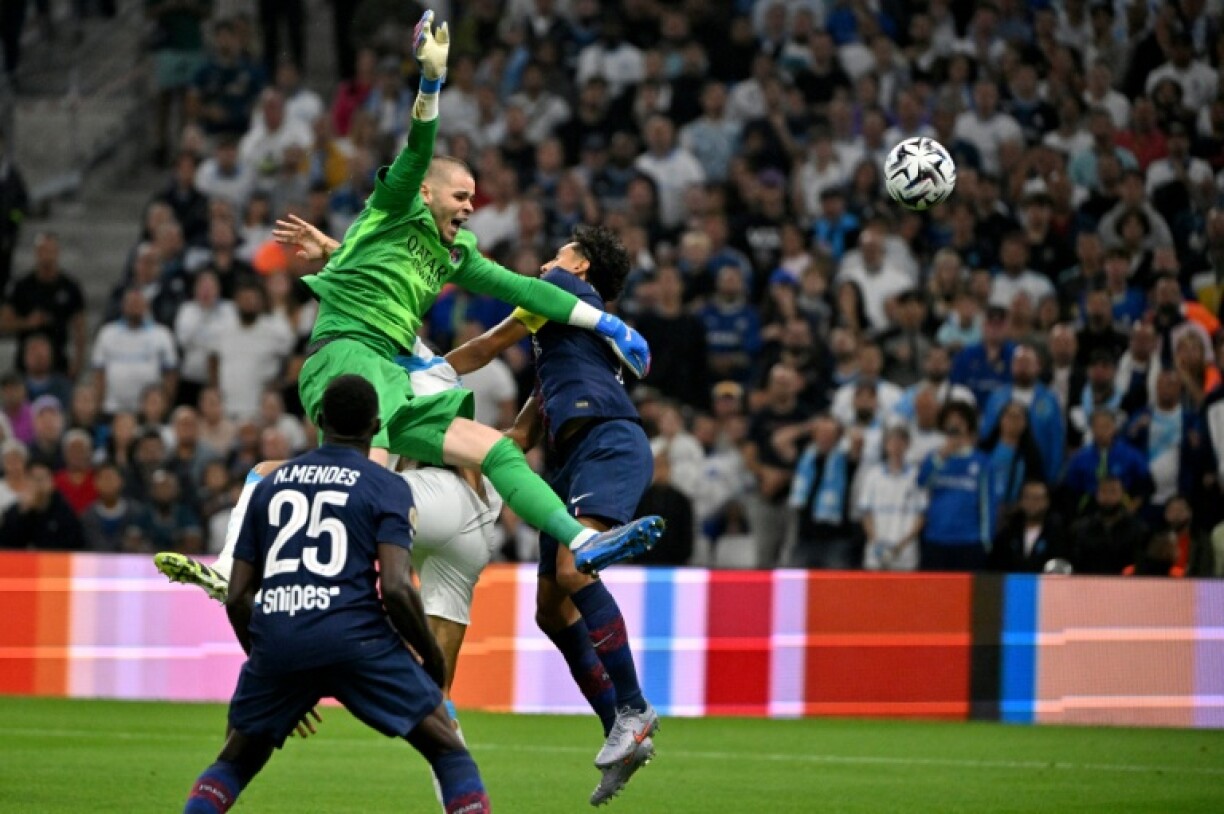 Paris Saint-Germain goalkeeper Lucas Chevalier comes for a cross and misses, allowing Nayef Aguerd to head in the winning goal for Marseille