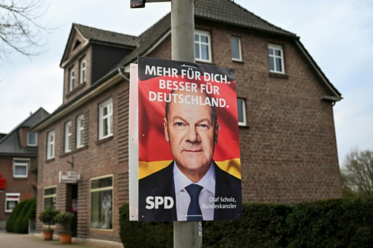 An election campaign poster for the Social Democratic Party's Chancellor Olaf Scholz with the message 'More for you, better for Germany'