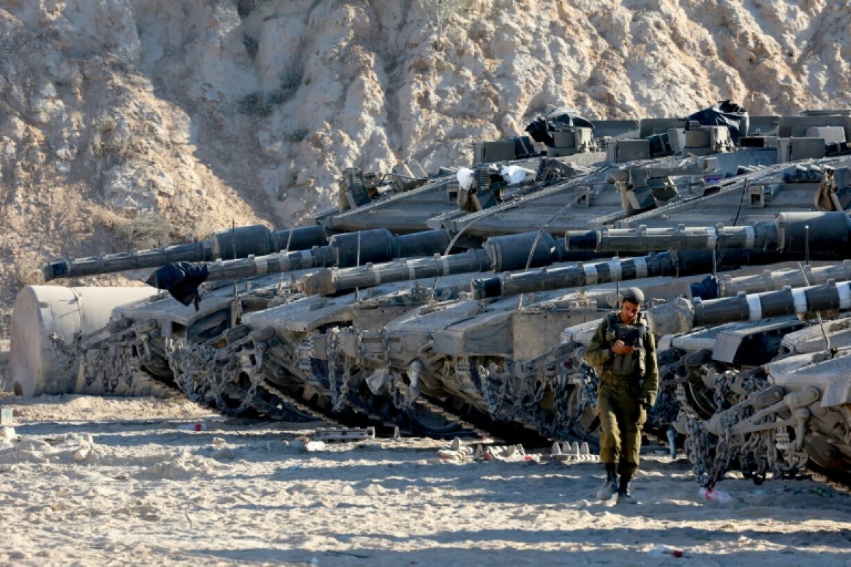 Israeli tanks take up positions on the Gaza border
