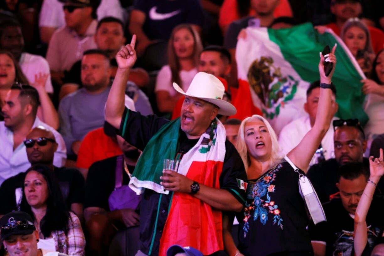 Boxing fans wait for a ceremonial weigh-in with Saul 'Canelo' Alvarez and Terence Crawford at T-Mobile Arena in Las Vegas