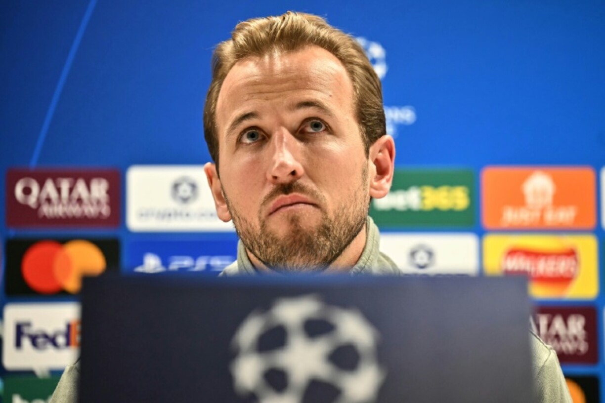 Bayern Munich's English striker Harry Kane talks at a press conference at Emirates Stadium in London on the eve of their UEFA Champions League league match against Arsenal
