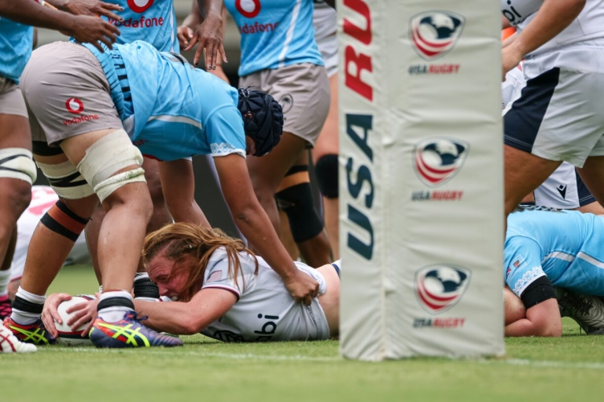 Cass Bargell of the United States dives with the ball during a 31-24 win over Fiji in Washington, DC, in July