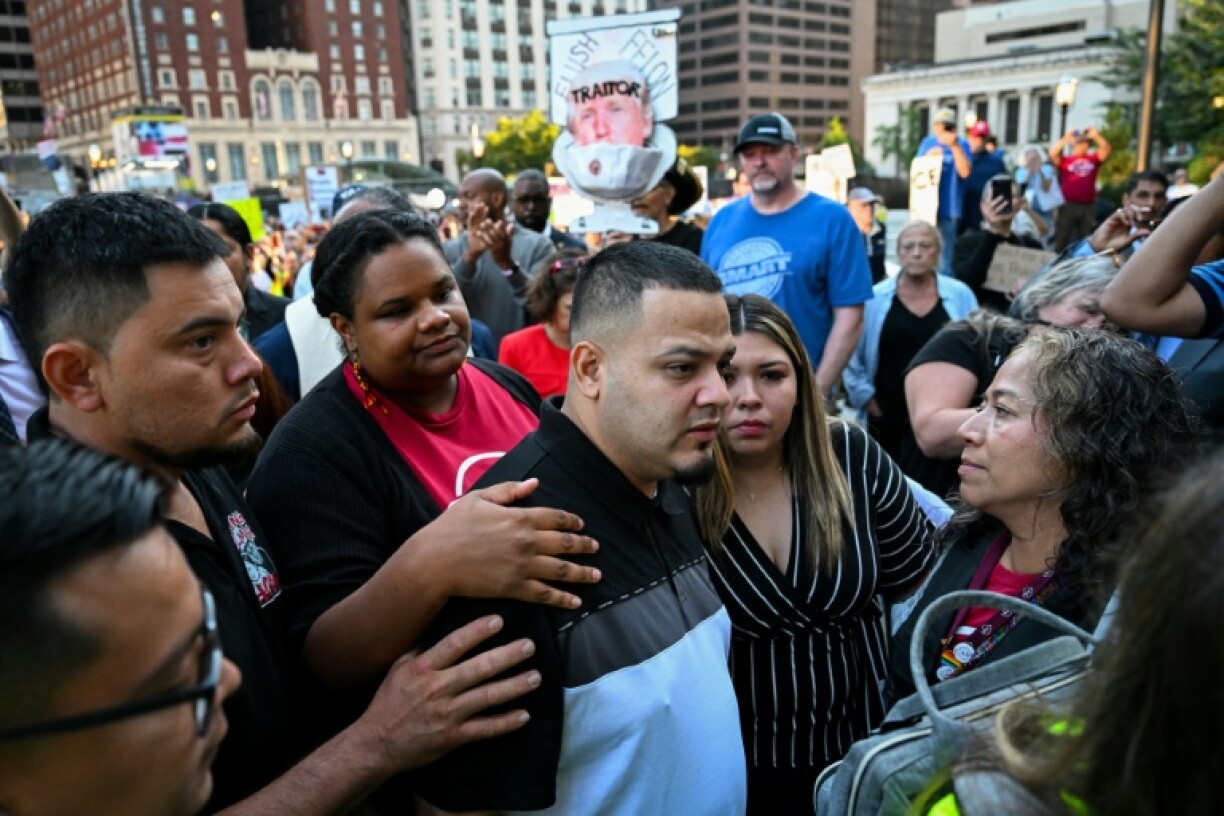 Kilmar Abrego Garcia (C) arrives at the US Immigration and Customs Enforcement field office in Baltimore, Maryland, where he was arrested