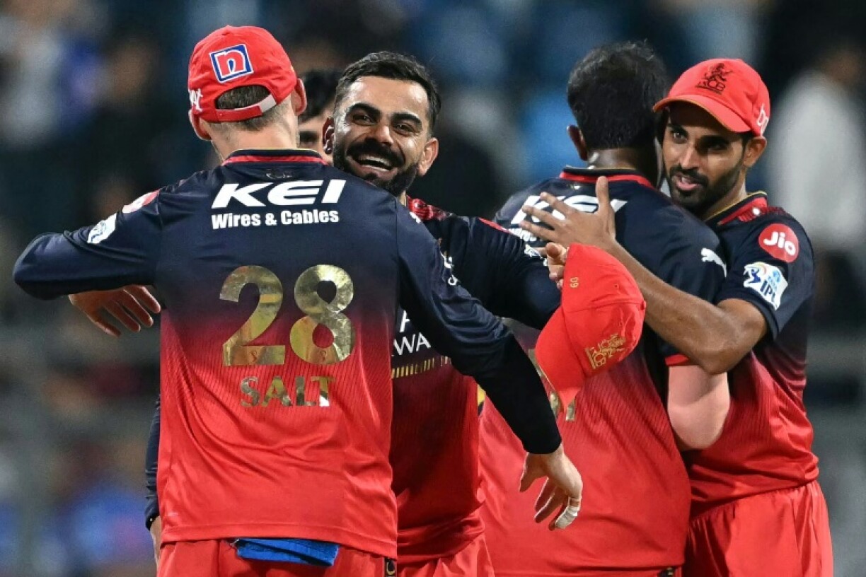 Virat Kohli (2L) and his Royal Challengers Bengaluru team-mates edged out Mumbai Indians in the IPL on Monday