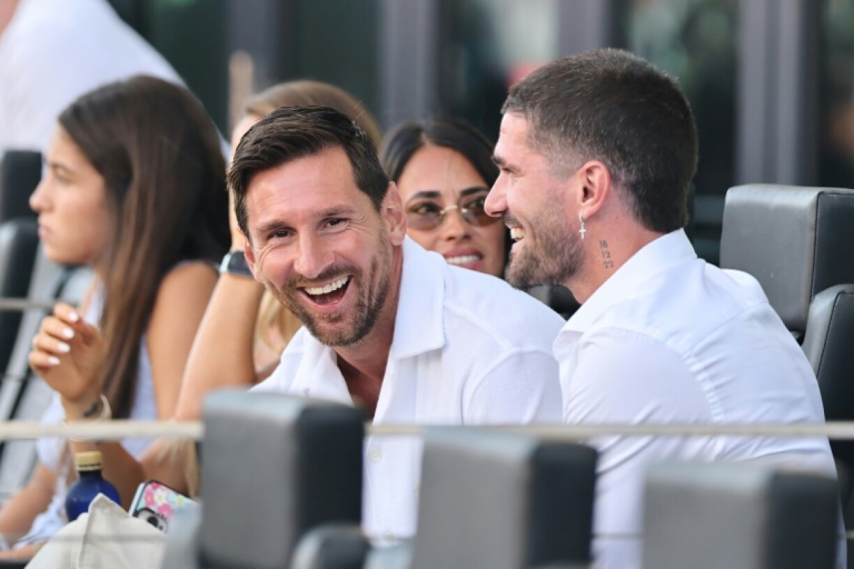 Lionel Messi (center) talks with Argentina team-mate and new Inter Miami signing Rodrigo De Paul ahead of the team's MLS clash with FC Cincinnati