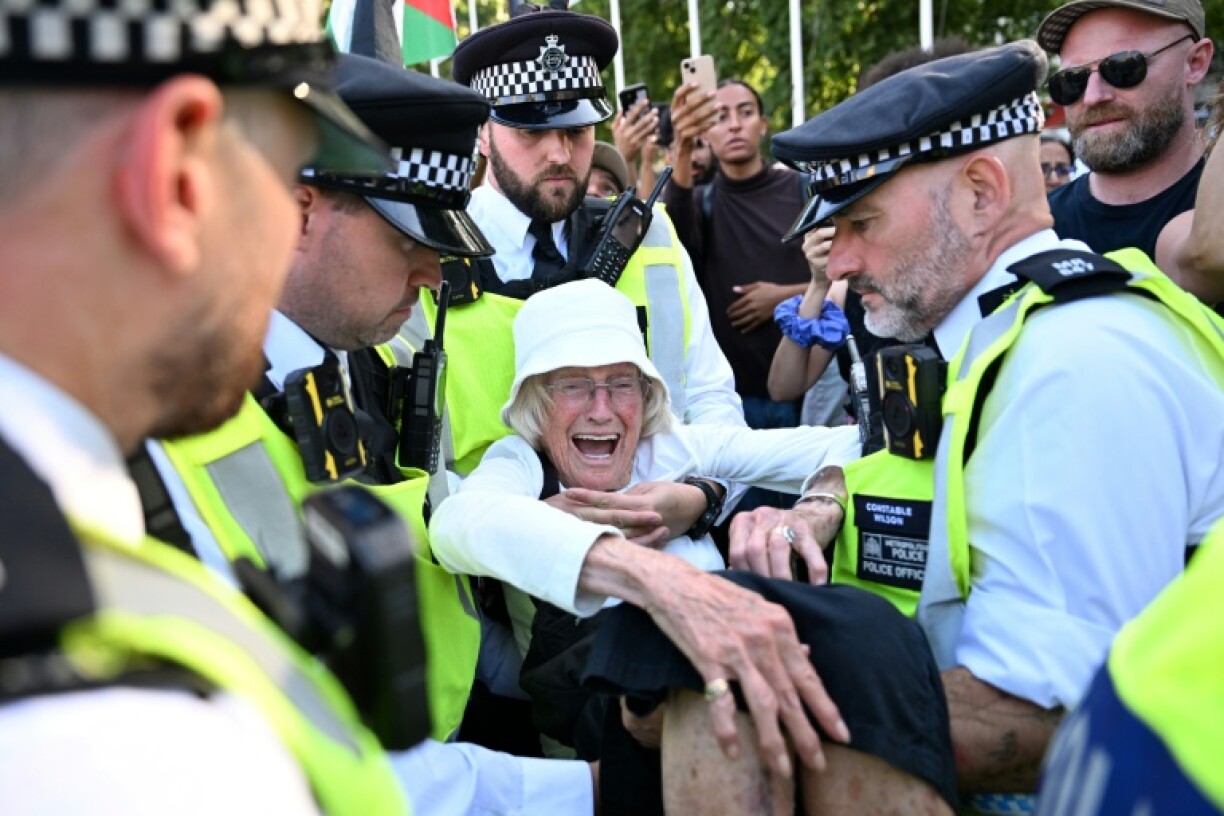 Over 500 people were arrested at a protest in London's Parliament Square on August 9 for displaying placards backing the group