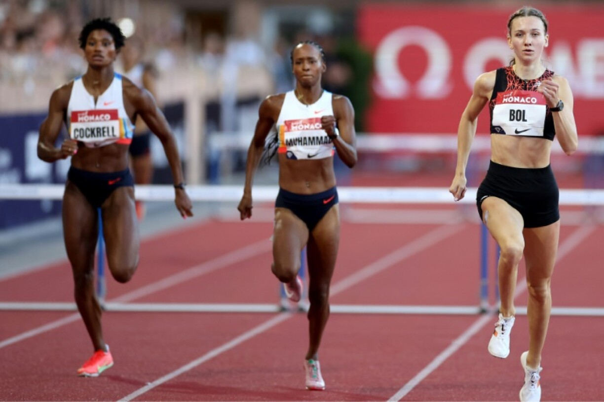 (From L) The US pair of Anna Cockrell and Dalilah Muhammad, alongside Dutch winner Femke Bol in the women's 400m hurdles