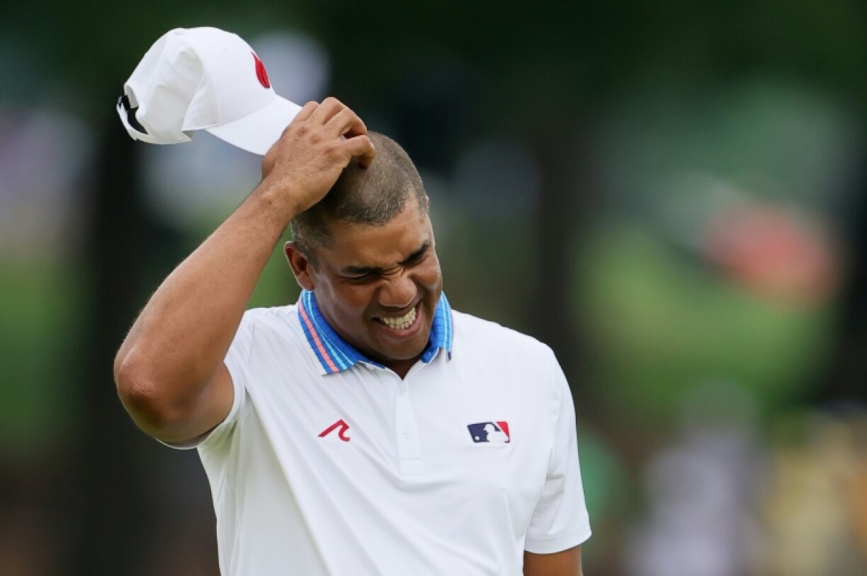Jhonattan Vegas of Venezuela made a double bogey on the 18th hole but still lead when he reached the clubhouse in the second round of the PGA Championship