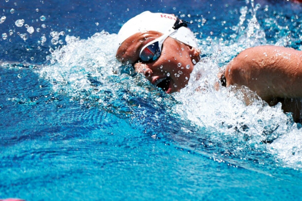 Summer McIntosh says she is relishing the prospect of battling Katie Ledecky at next month's World Championships