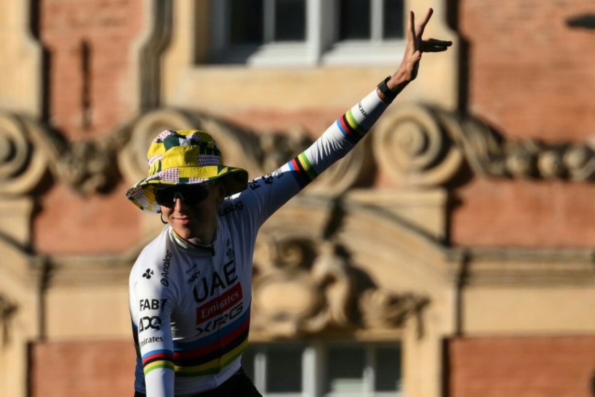 Tadej Pogacar waves to fans in Lille city centre during the official team presentation two days ahead of the Tour de France