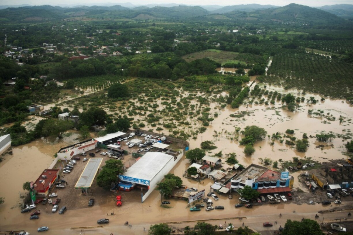 This aerial view taken during a Mexican Navy flyover shows flooded streets after heavy rains in Poza Rica, in Veracruz state