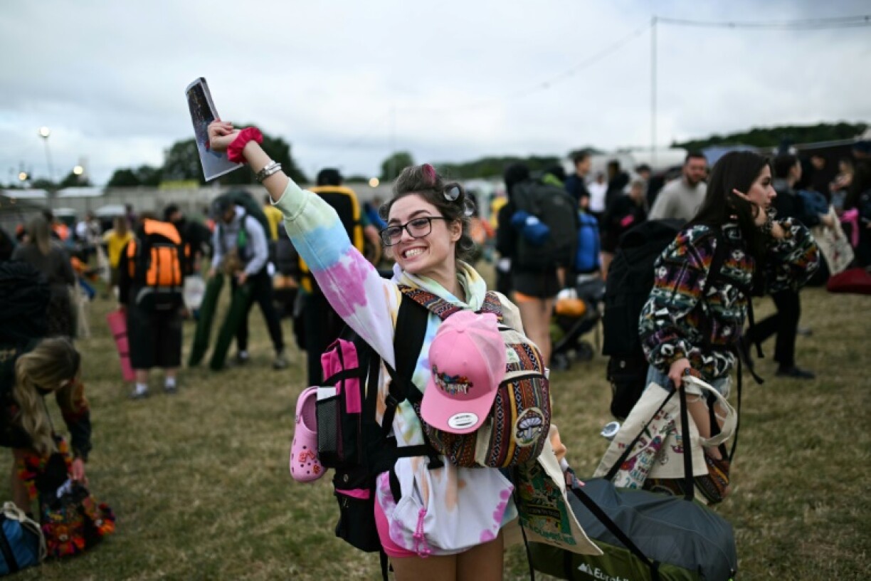 Many ticket-holders, ladened with tents and backpacks, arrived early to claim the best camping spots