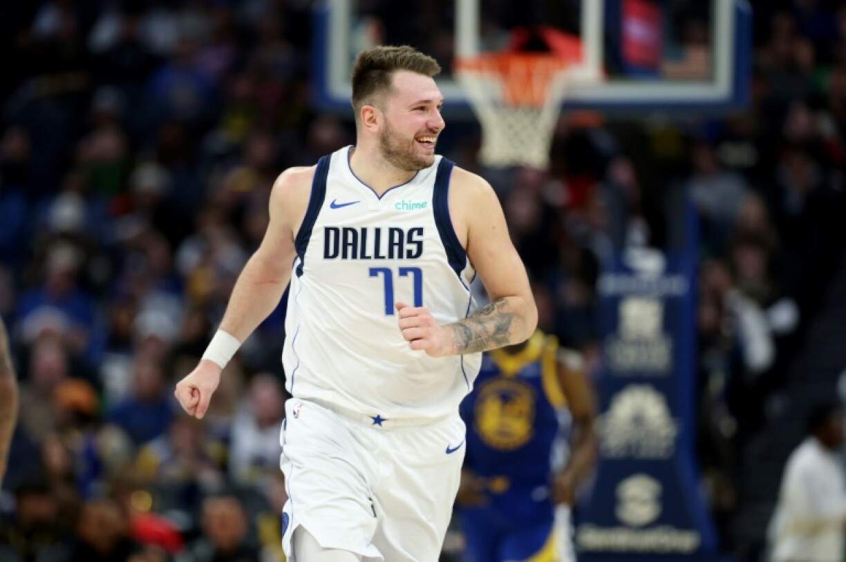 Luka Doncic reacts after scoring for the Dallas Mavericks in an NBA game against the Golden State Warriors