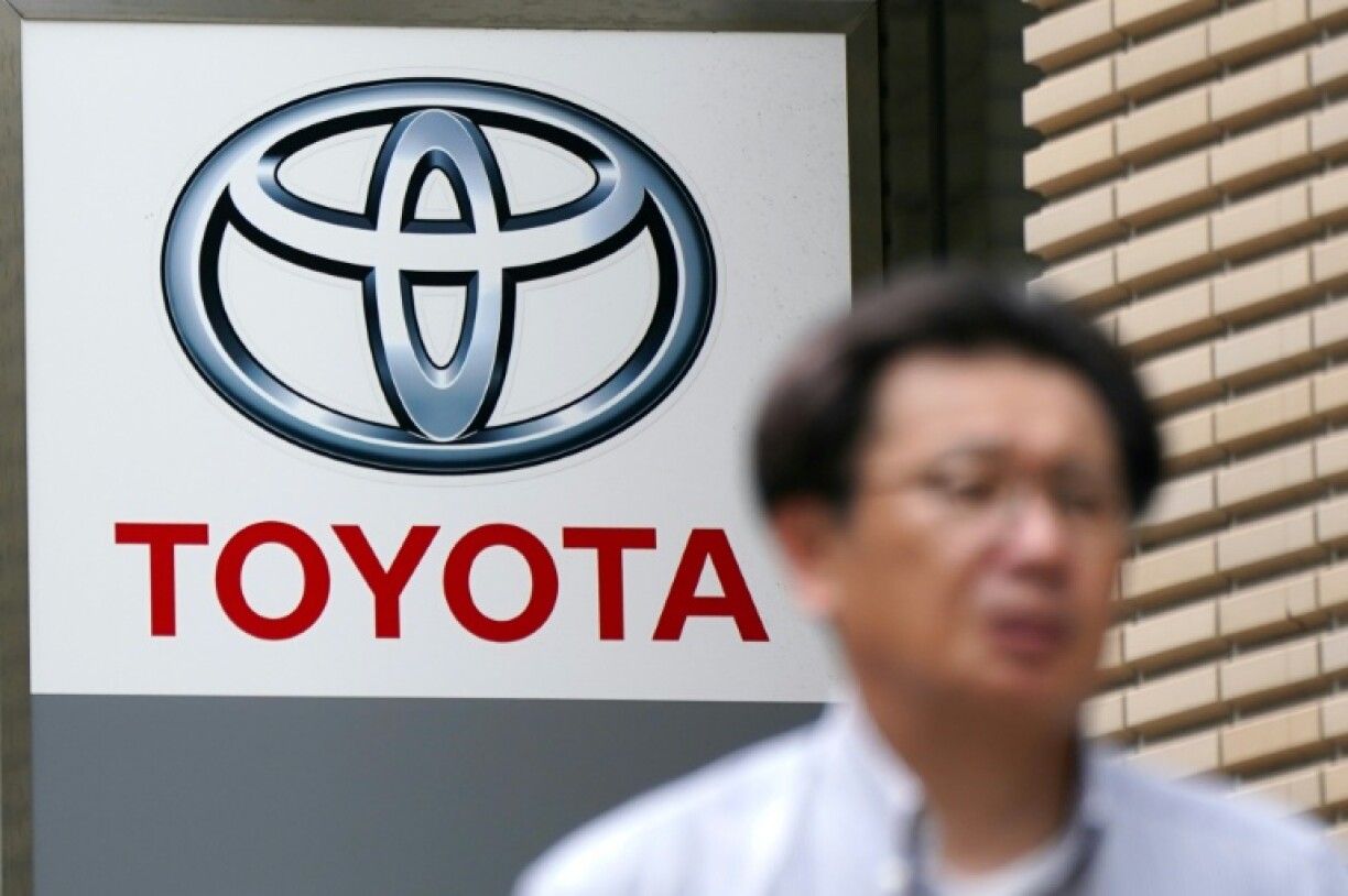 US tariffs prompted Japanese auto giant Toyota on Thursday to cut its annual net profit forecast by 14 percent