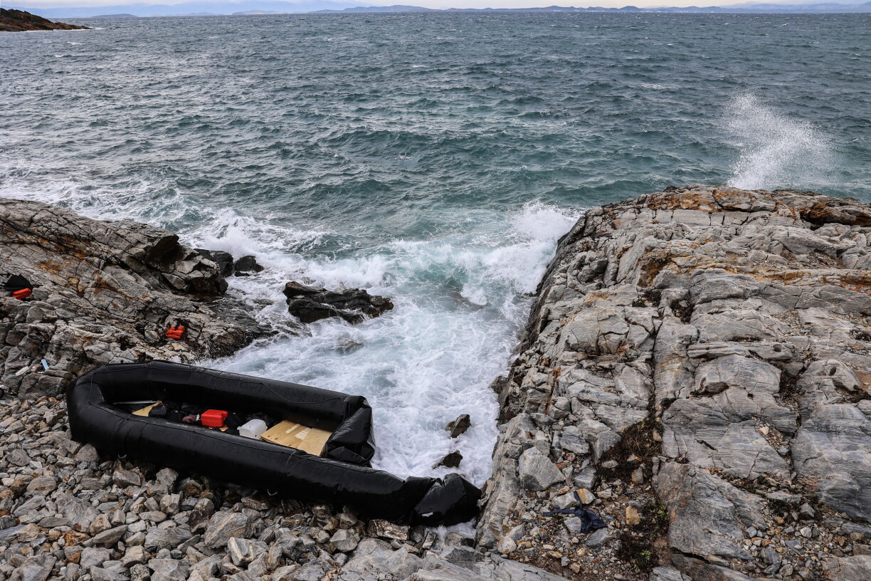(FILES) This photograph taken on January 10, 2024, shows an inflatable dinghy washed up on the rocky shores of Agios Georgios, east of the Greek island of Lesbos in the Aegean Sea.