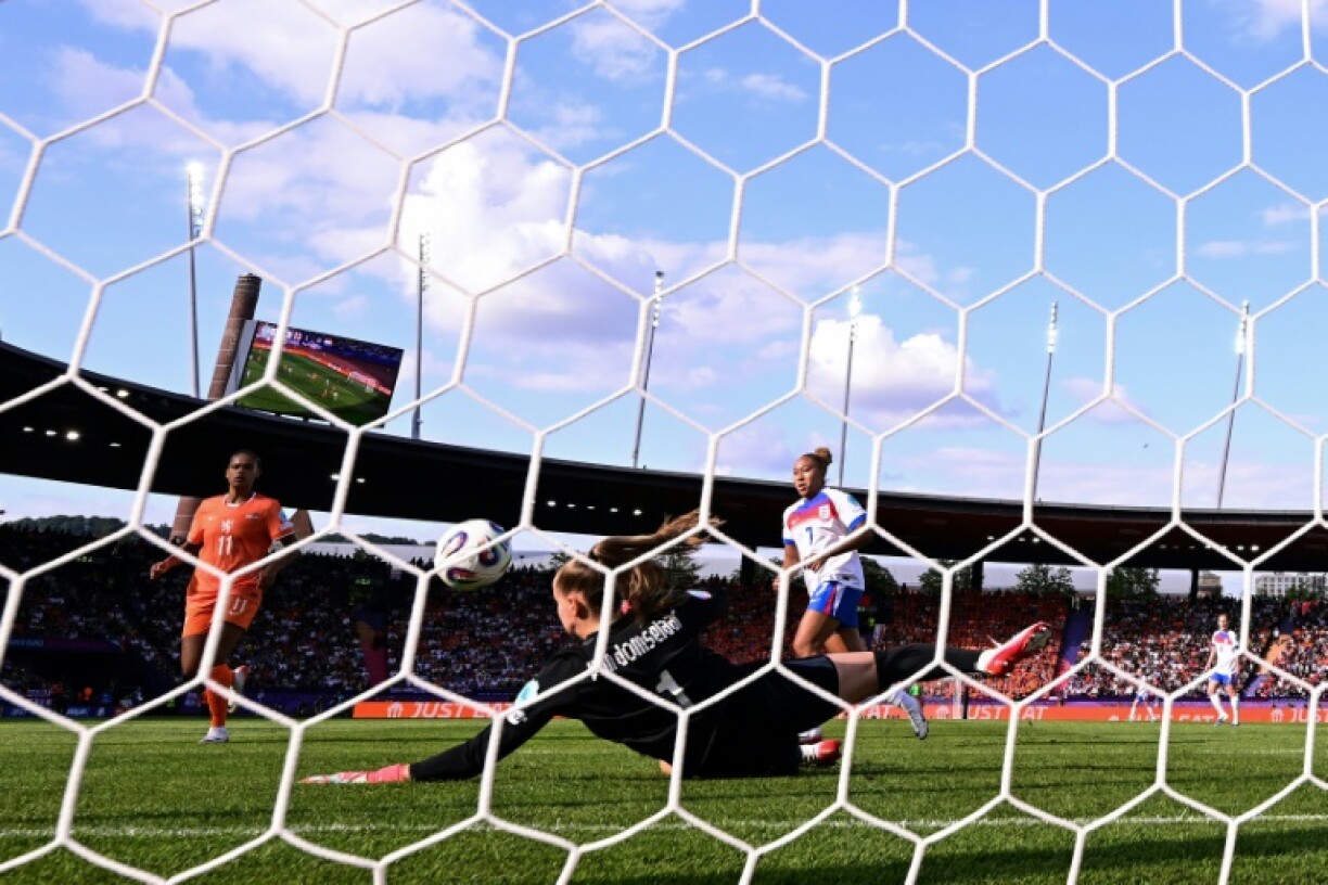 Lauren James (R) scores her second goal against the Netherlands at Women's Euro 2025