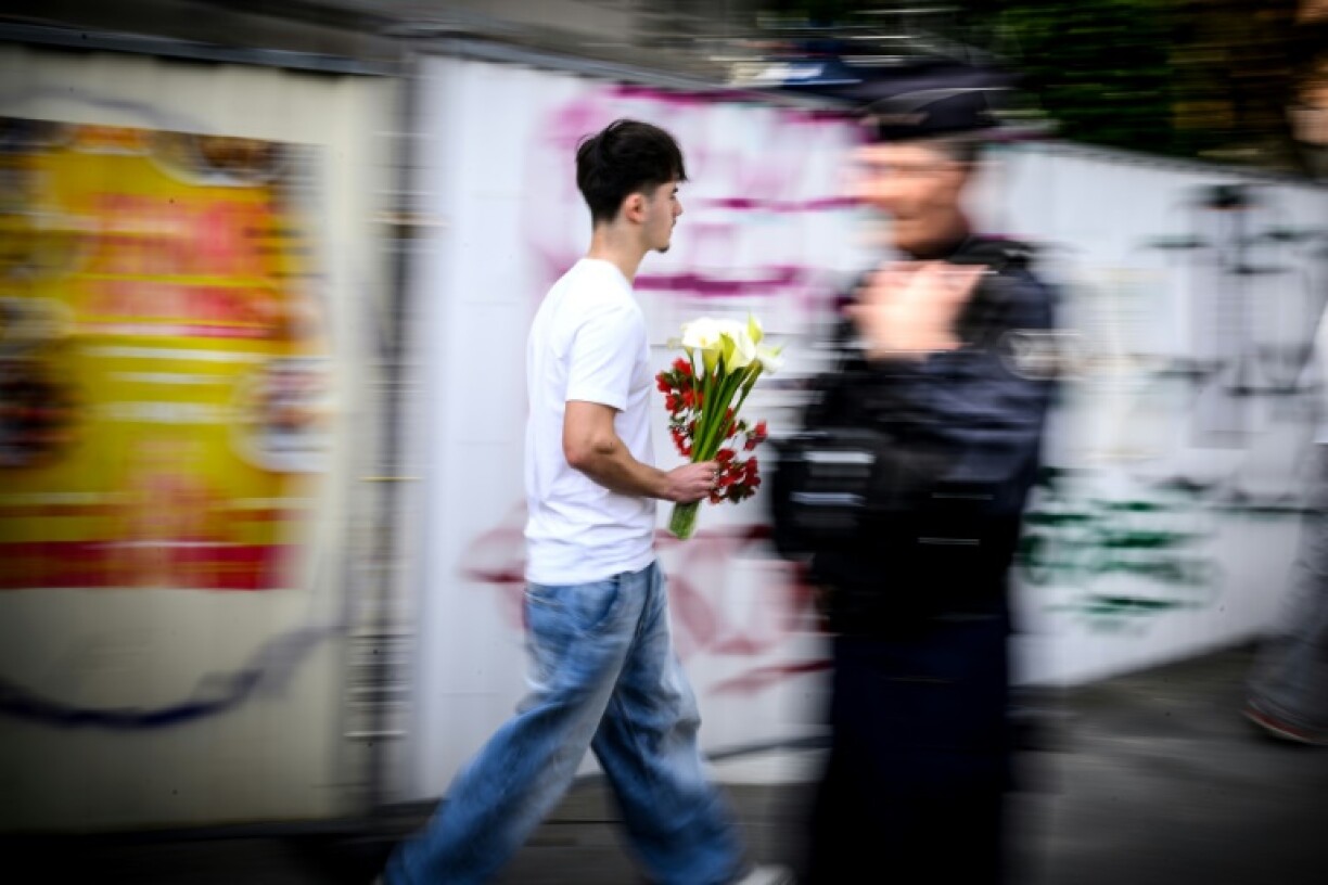 Students brought white flowers the day after the attack