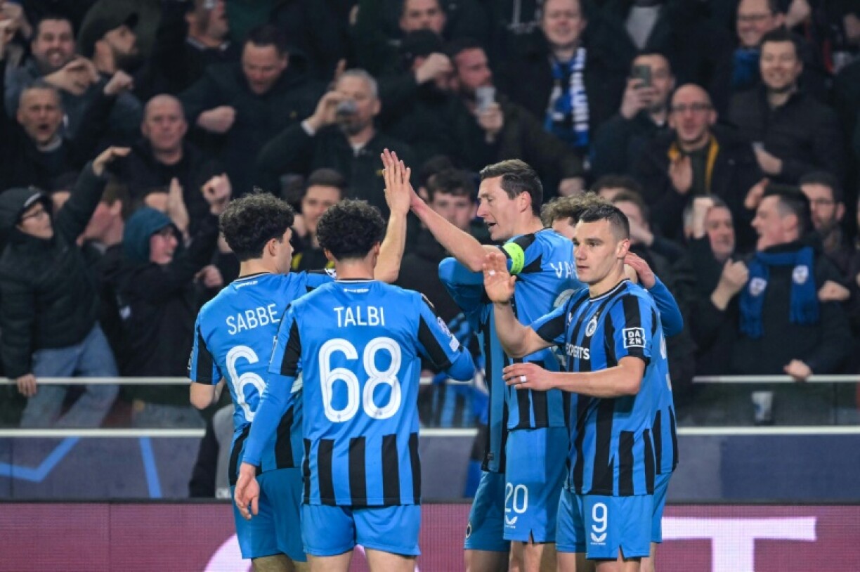 Club Brugge players celebrate after Maxim De Cuyper's first-half equaliser