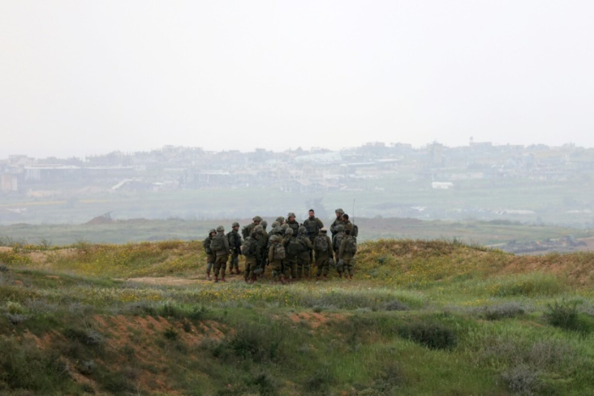 Israeli army soldiers along Israel's southern border with the Gaza Strip on March 20