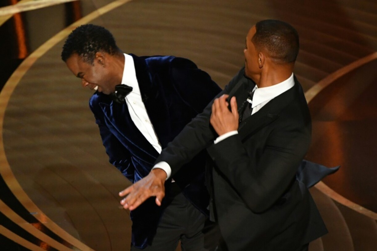 Will Smith gifle Chris Rock sur la scène des Oscars, le 27 mars 2022 à Hollywood