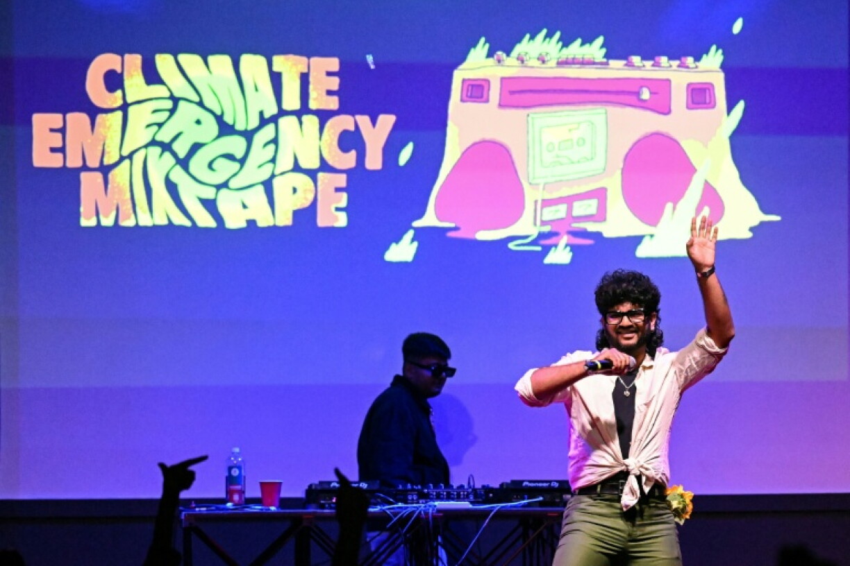 This photograph taken on October 1, 2026 shows rapper Kali, aka Akshay, performing onstage during the launch of the Indian multi-lingual rap album on climate crisis 'Climate Emergency Mixtape' at The Humming Tree in Bengaluru.