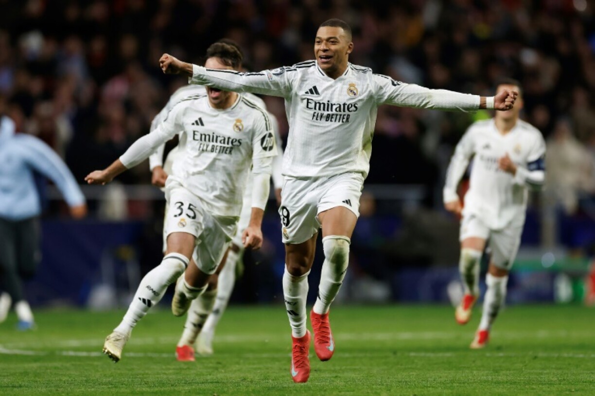 Kylian Mbappe celebrates after Real Madrid beat Atletico Madrid in the Champions League on Wednesday