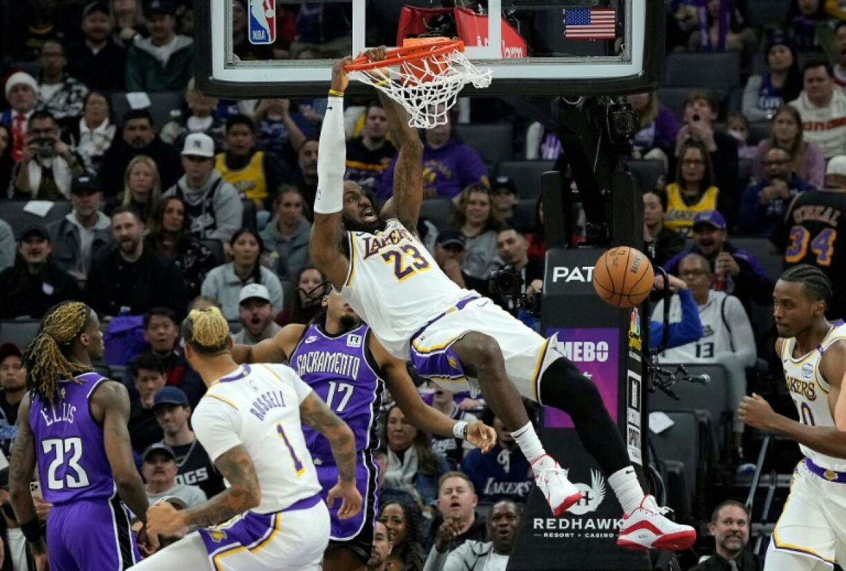 Los Angeles Lakers star LeBron James throws down a dunk in an NBA game against the Sacramento Kings in December 2024