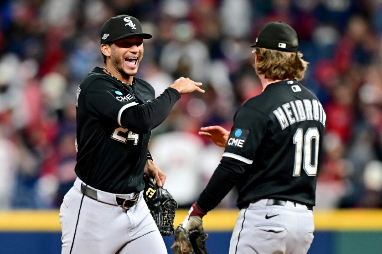 Chicago White Sox players Braden Montgomery (left) celebrates with team-mate Chase Meidroth defeating the Cleveland Guardians