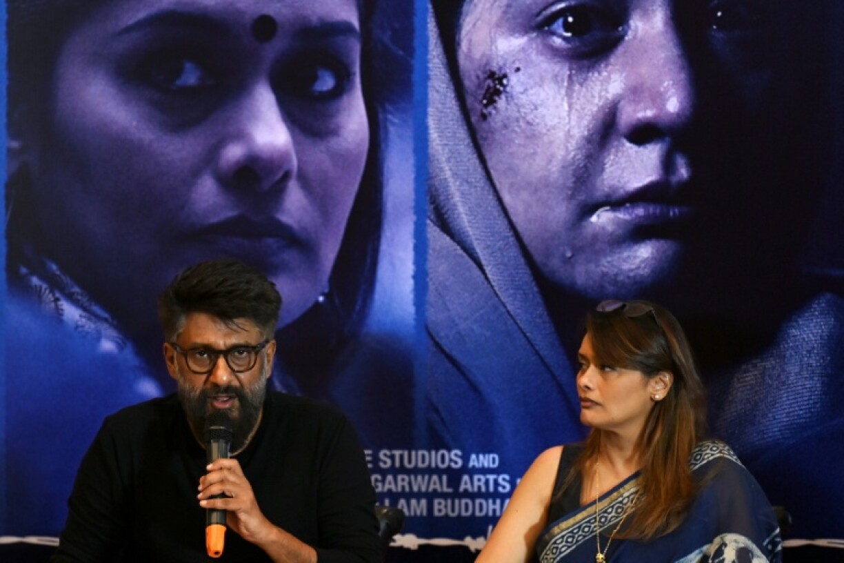 Indian film director Vivek Agnihotri (L) says viewers want to know what happened behind the scenes of the military operation