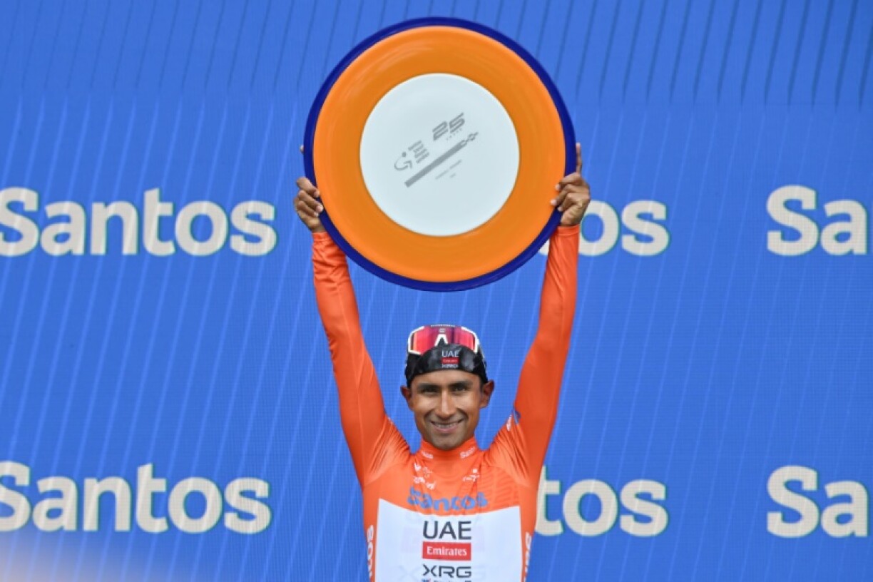 UAE Team Emirates rider Jhonatan Narvaez from Ecuador holds the winner's trophy after the final stage of the Tour Down Under cycling race in Adelaide