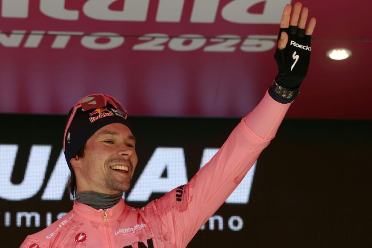 Red Bull-Bora-Hansgrohe's Slovenian rider Primoz Roglic took the leader's pink jersey on stage seven