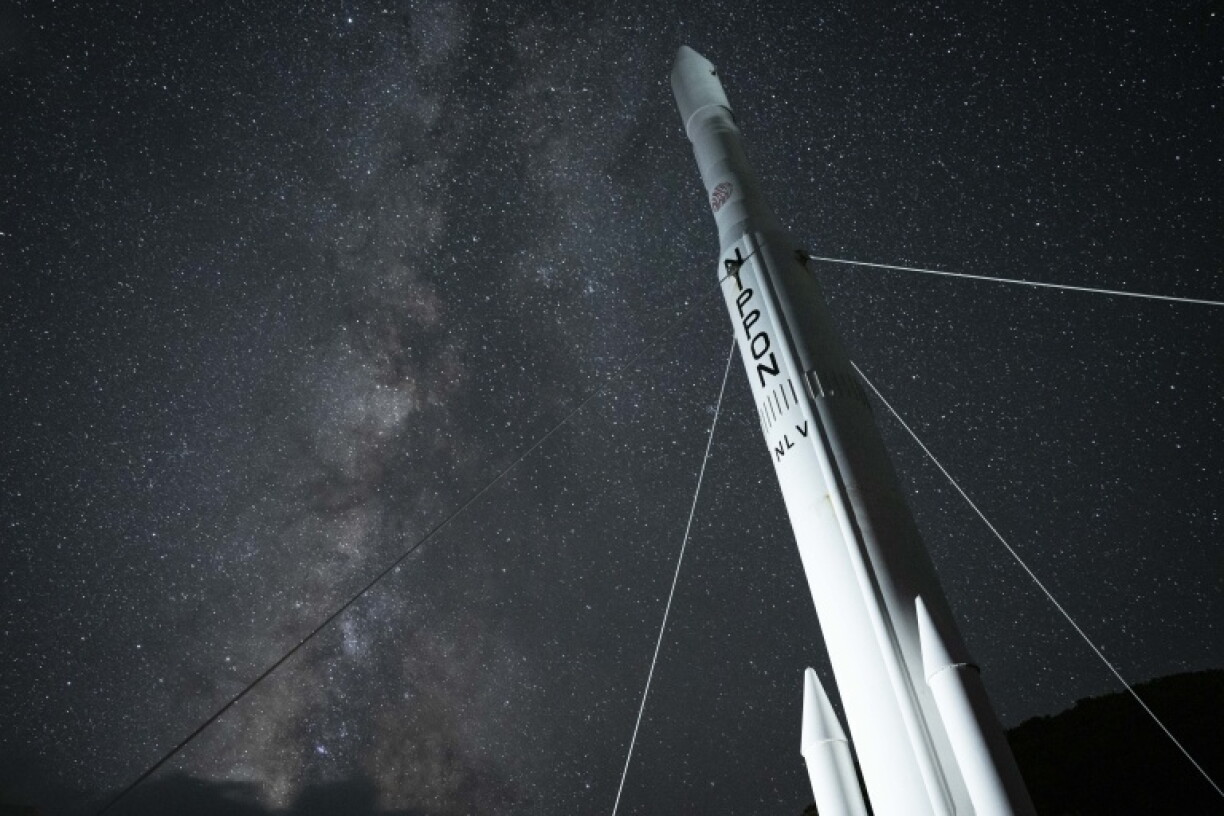 The Milky Way above a rocket model during the Perseid meteor shower at the Tanegashima Space Center in Minamitane, Kagoshima prefecture