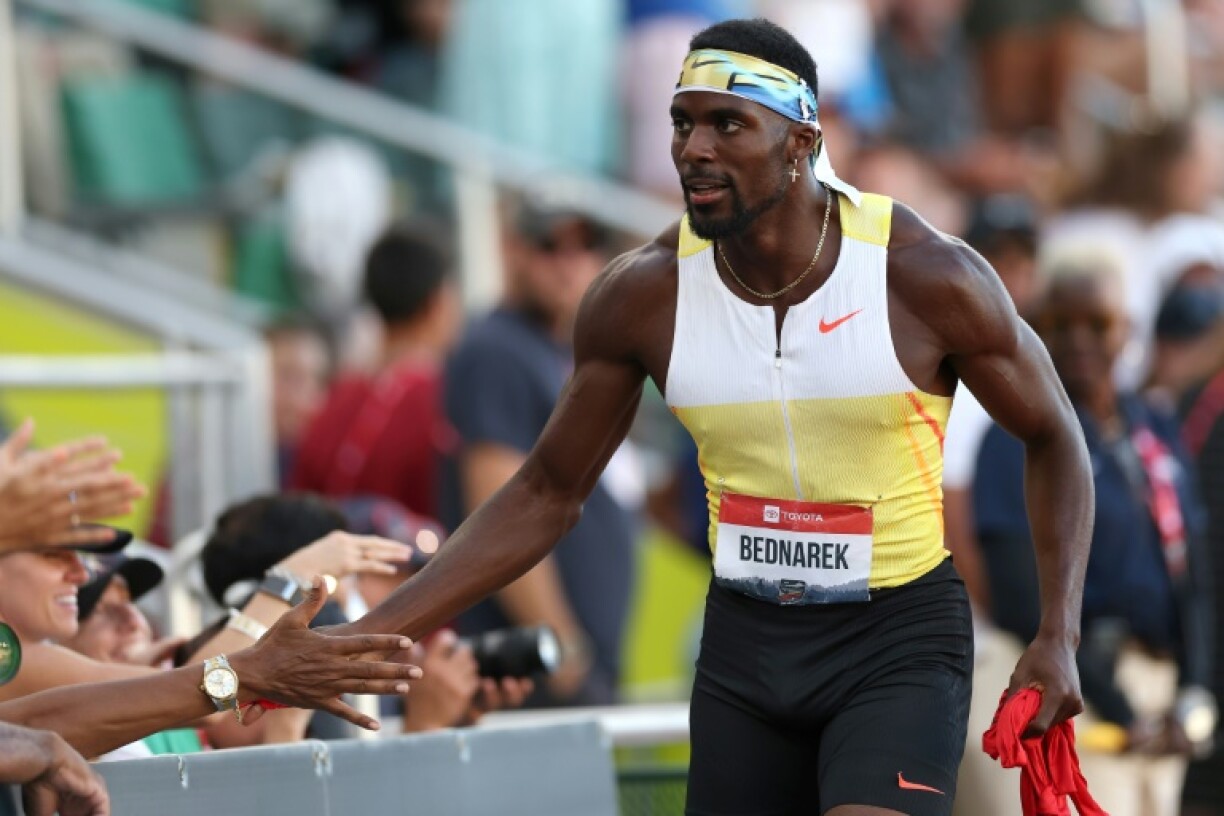 Kenny Bednarek celebrates with fans after winning the 100m at the US track and field championships