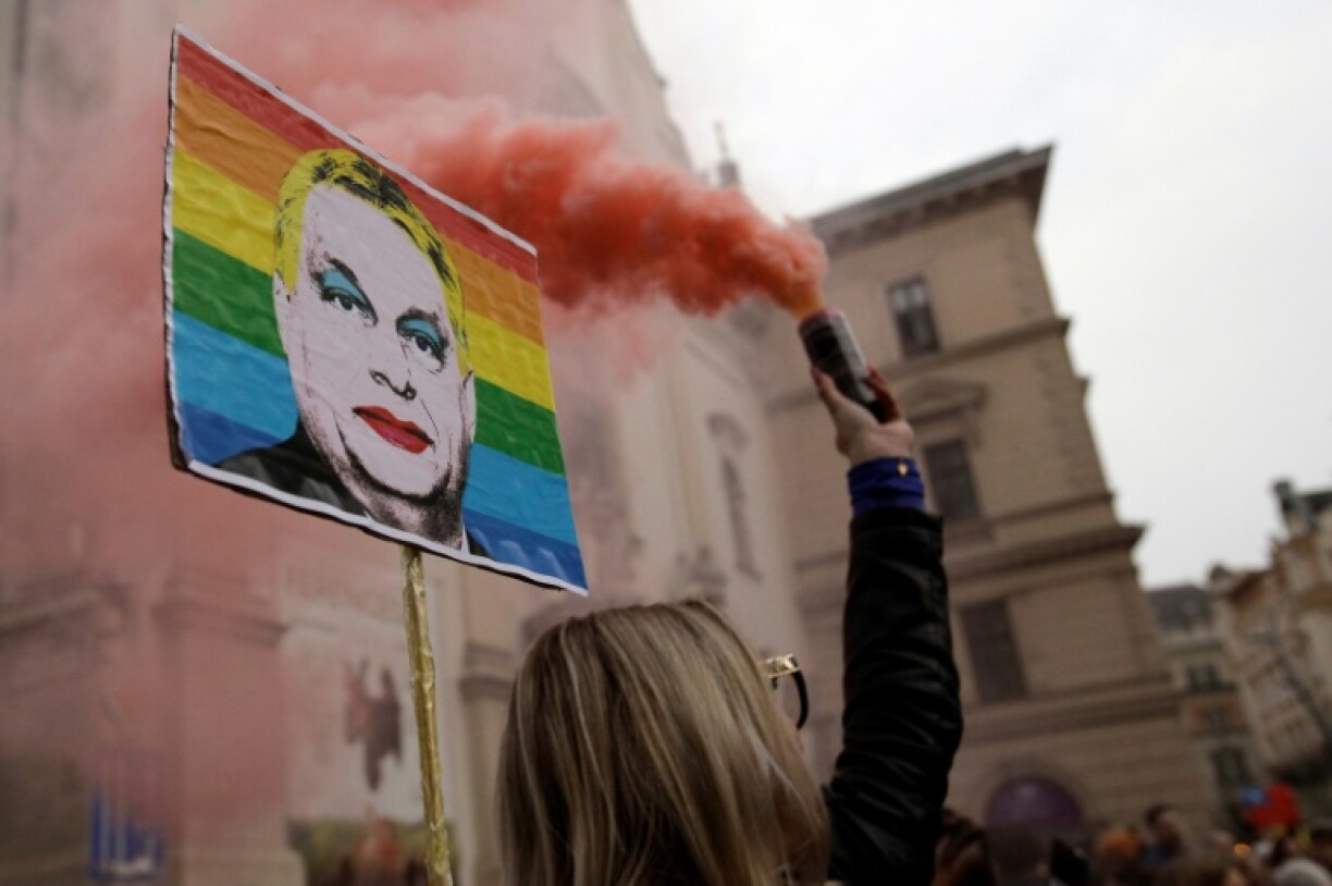 A placard depicting PM Viktor Orban at a protest in Budapest against restrictions on freedom of assembly