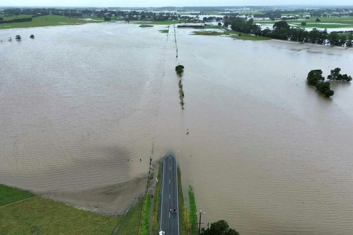 Record downpours have left homes, business and roads submerged
