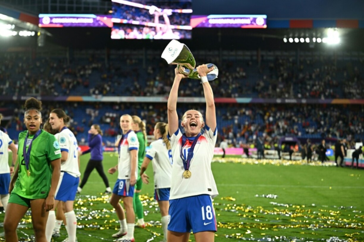 Chloe Kelly celebrates after England beat Spain to win Euro 2025