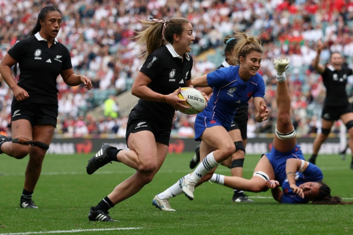 New Zealand full back Renee Holmes scores a try during the Women’s Rugby World Cup third-place match against France at Twickenham