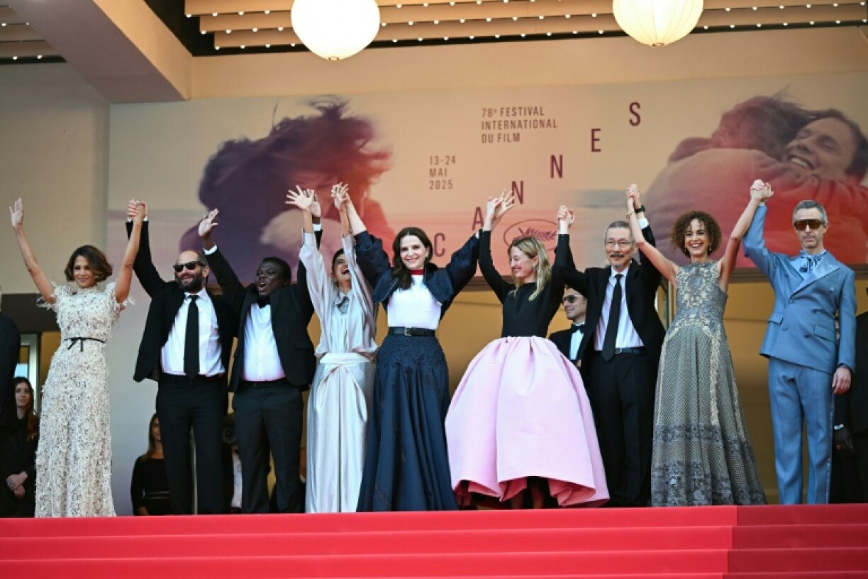 Strong, on the right in blue, with his fellow jury members on Saturday evening