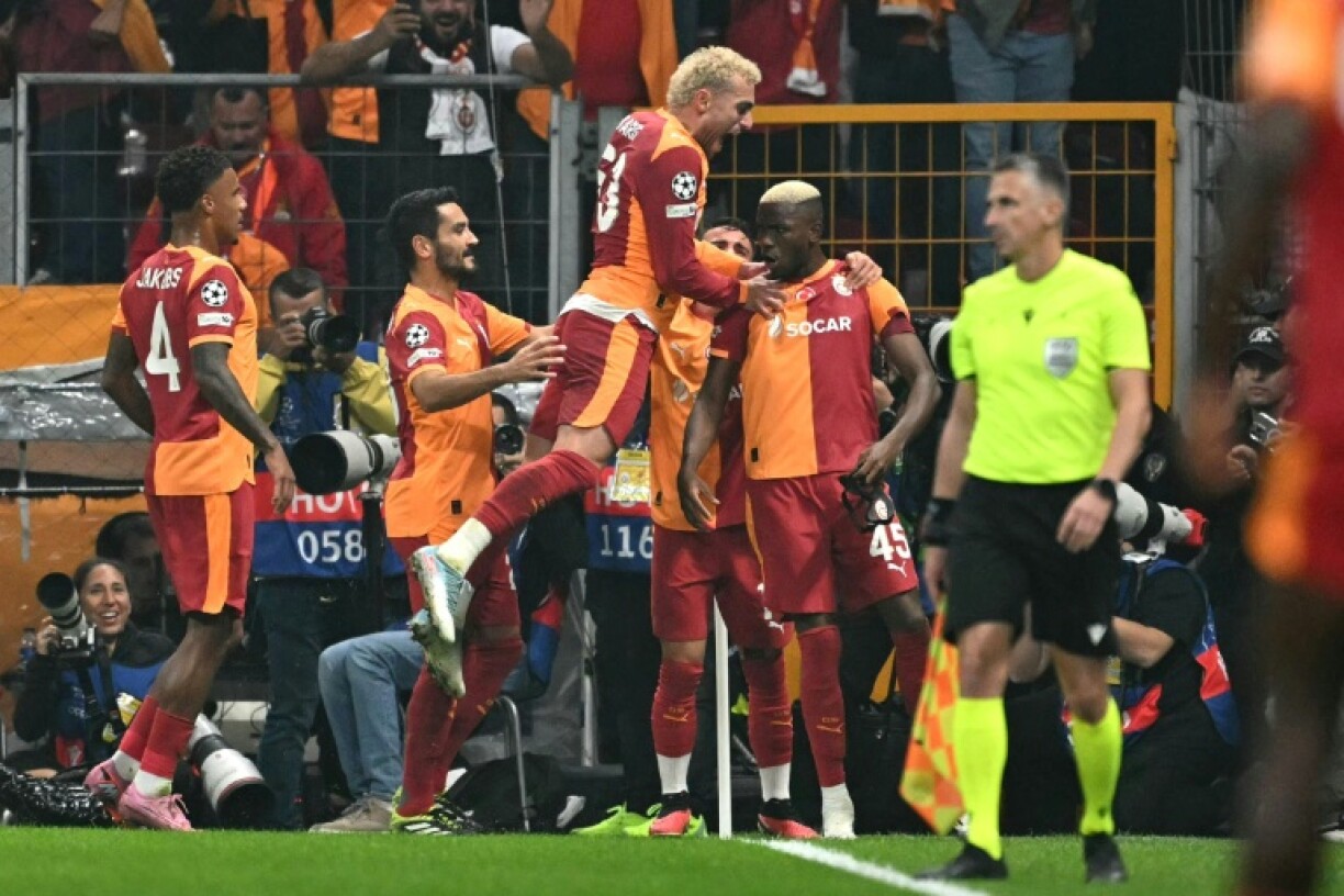 Victor Osimhen celebrates with teammates after scoring for Galatasaray in their win against Liverpool